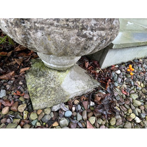 341 - Pair of constituted stone planters, 2ft d x 19''h (one is in need of repair)