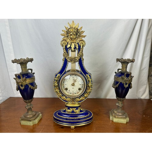 399 - French style Marie Antoinette brass ornate clock and two vases (not matching)