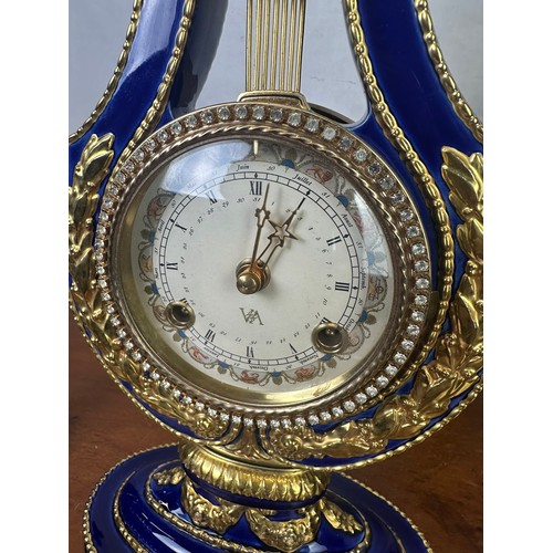 399 - French style Marie Antoinette brass ornate clock and two vases (not matching)