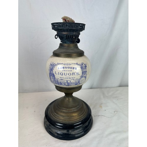 119 - Demijohns Choice Liquor vintage oil lamp