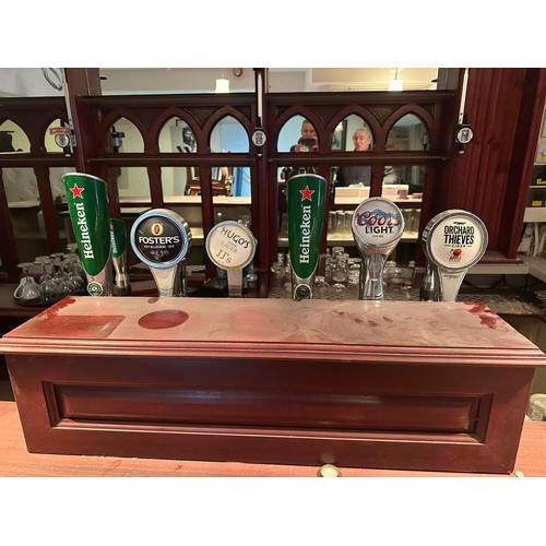 67 - A collection of 3 bar taps - Heineken Fosters and Hugos