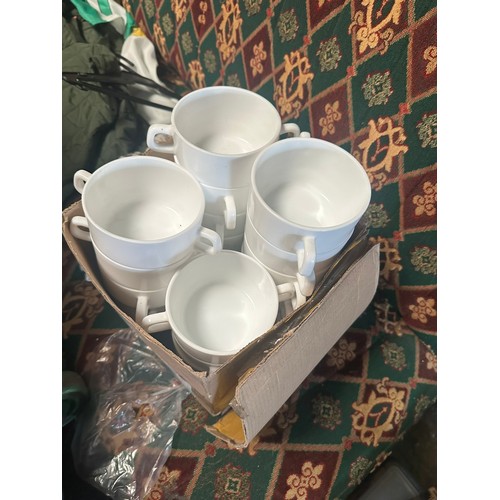 125 - A large collection of soup bowls and cups