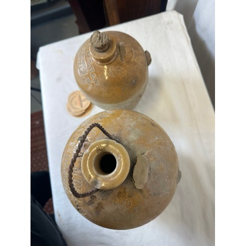 284 - 2 earthenware flagons - Patrick Meehan Maryborough and P.A. Meehan Abbeyleix. Also a large quantity ... 