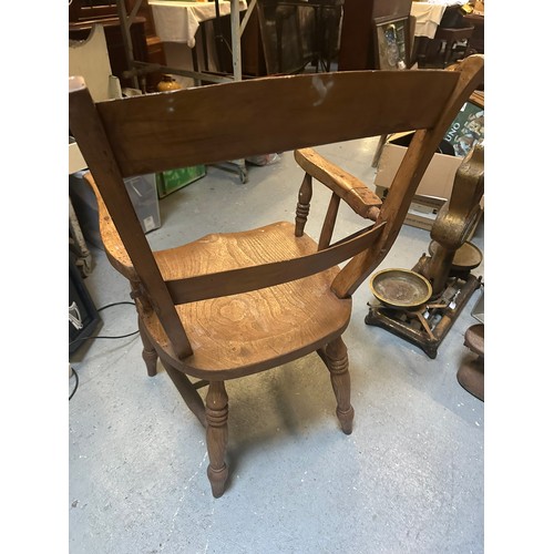 279 - Irish pub fireside smokers chair with repairs. 18'' seat h x 19'' x 20''w. Very solid