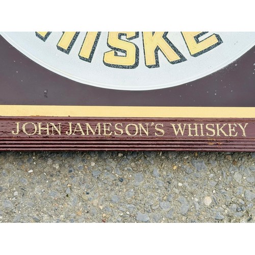 201A - John Jameson Whiskey Mirror 1930’s, reverse painted on plated glass. Housed in Oak Frame. H51cm W51c... 