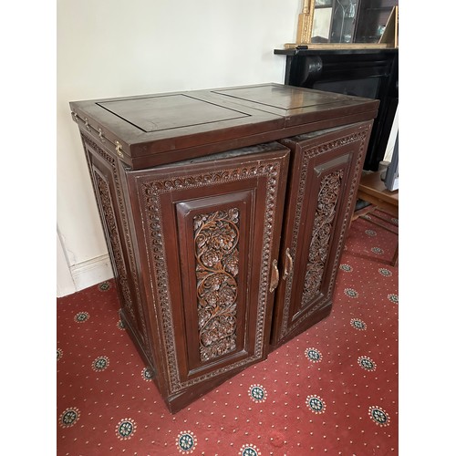 65 - Profusely carved on all sides Chinese expandable bar cabinet, solid wood, brass fittings, with 2 doo... 