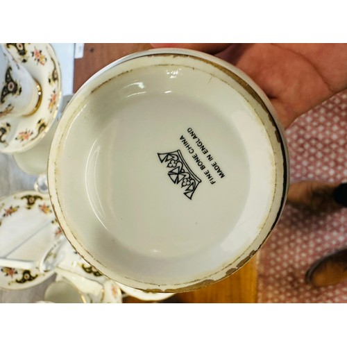 300 - 20 piece fine bone china tea sevice including tea pot. one side plate missing