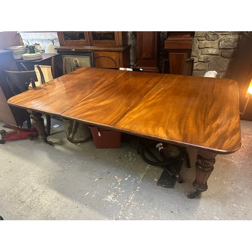 144 - Superb large Georgian oak dining winding extendable table with centre leaf. Robust legs and large br... 