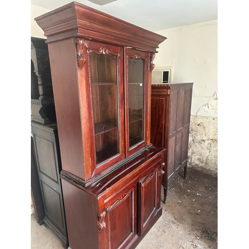 128 - Mahogany two part book case with 2 upper glazed doors , 2 drawers and 2 solid lower doors, 42''w x 1... 