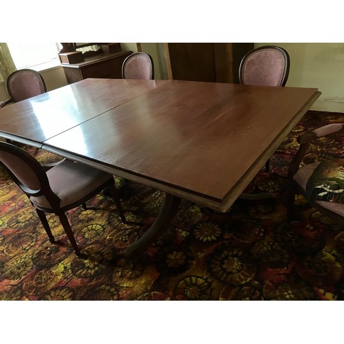 67 - Superb large oak dining table, 2 halves on 2 central 3 legged pods on brass castors. very good condi... 