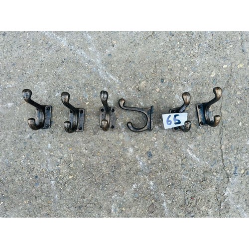 419 - Treble school house cast iron coat hooks  14cm H x 7cm L x 8cm D