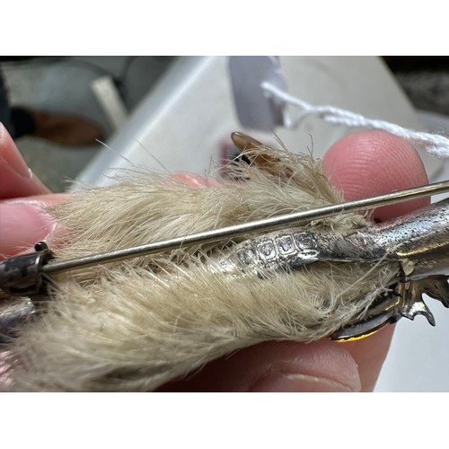 60 - pair of grouse feet broaches, one is hallmarked silver