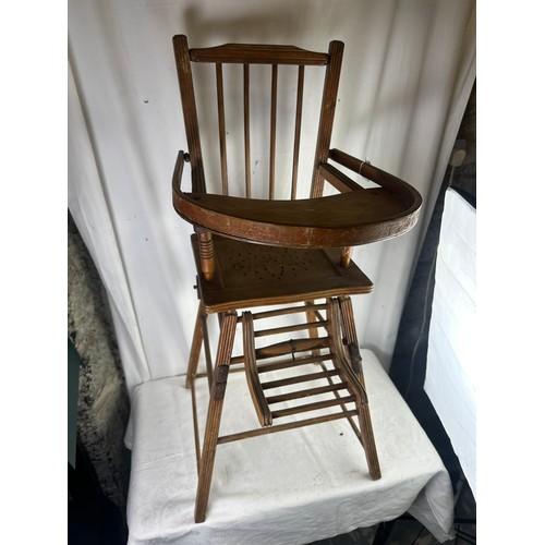 75 - A 19th century French childs high chair that folds down to a walker with original wheels