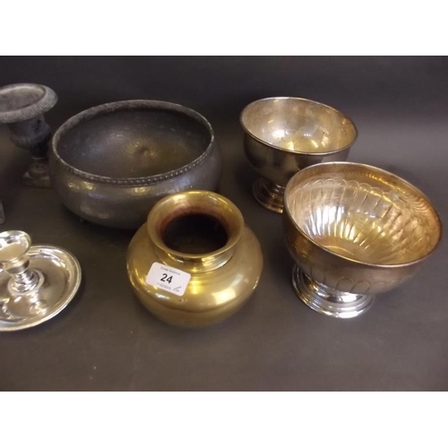 24 - Four small lead classical urns, a pewter fruit bowl, two silver plate pedestal bowls, a candlestick ... 