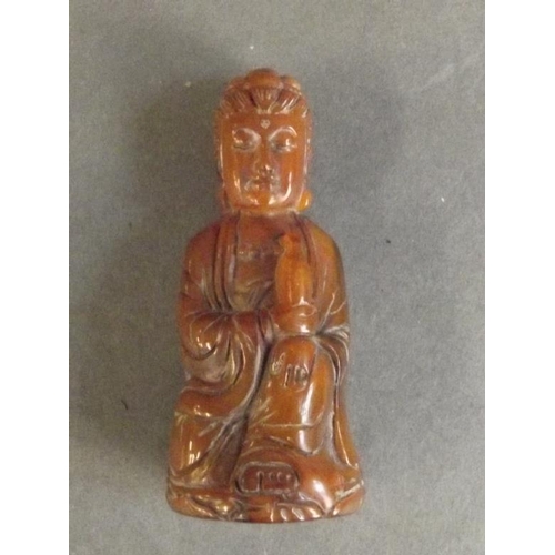 46 - A small carved horn figure Quan of Yin, 3