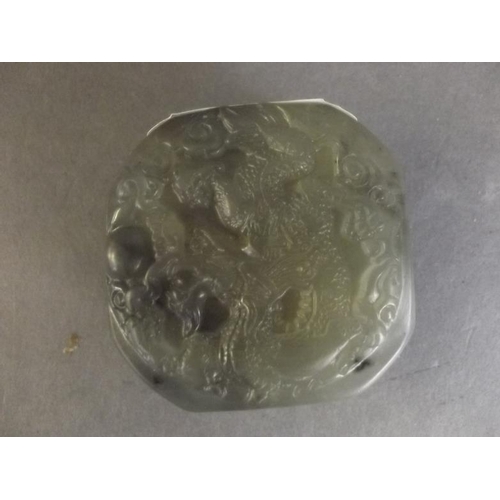 48 - A Chinese jade seal with a carved dragon top, 2