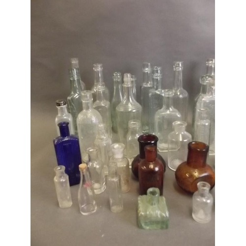 8 - A collection of antique bottles including medicine (54)