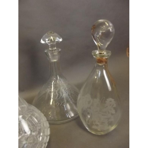 17 - Two crystal glass ship's decanters, plus three other decanters, tallest 13