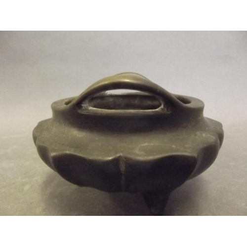 49 - A Chinese bronze phoenix eye censer of lotus form, 5