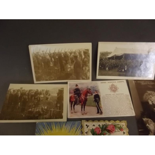 50 - A collection of postcards, mostly WWI including military vehicles, funerals, shipping greetings etc ... 