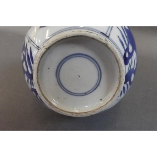 1 - A Chinese blue and white porcelain bottle vase decorated with floral panels, double ring mark to bas... 