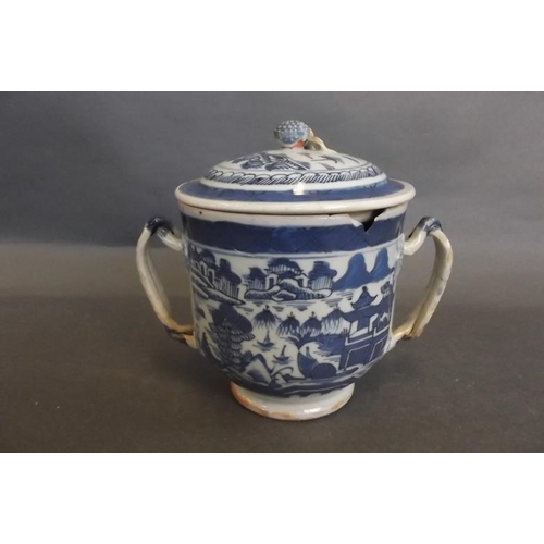 16 - A C19th Chinese blue and white porcelain loving cup and cover with rope twist handles, decorated wit... 