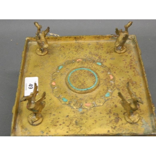 49 - An Oriental gilt bronze stand on dragon supports and phoenix mounts, inset with turquoise, 8