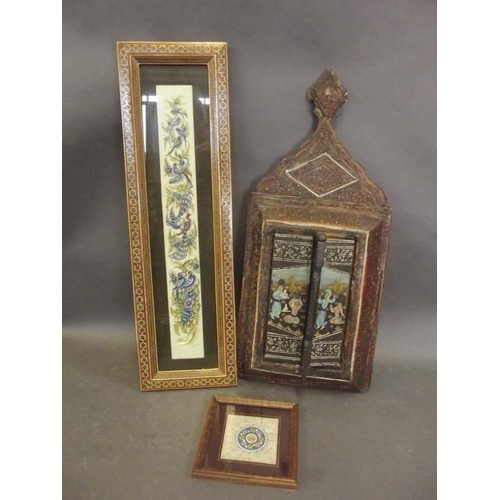 50N - A Kashmiri inlaid and painted wood hanging wall mirror, a panel decorated with peacocks and exotic b... 