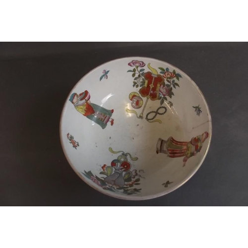 53 - A Continental porcelain pedestal bowl decorated in bright enamels with figures and symbols in the Or... 