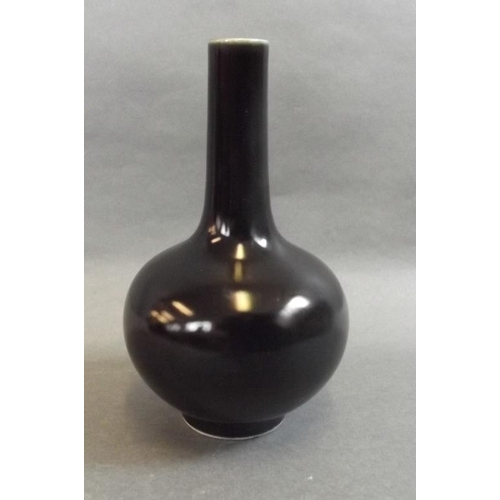 58 - A Chinese porcelain black glaze vase with slender neck and bulbous body, 4 character mark to base, 6... 