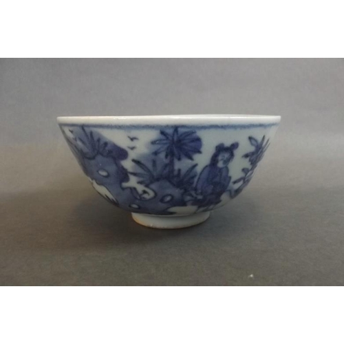 62 - A Chinese blue and white porcelain rice bowl decorated with figures in a landscape, 6 character mark... 