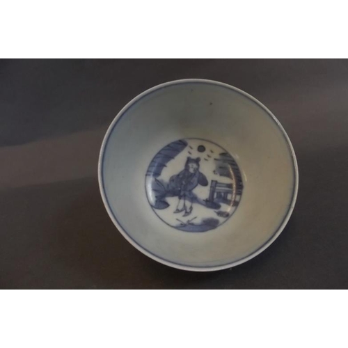 62 - A Chinese blue and white porcelain rice bowl decorated with figures in a landscape, 6 character mark... 