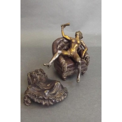 79 - A Vienna style cold painted bronze of a woman reclining on a chair with removable dress, impressed '... 