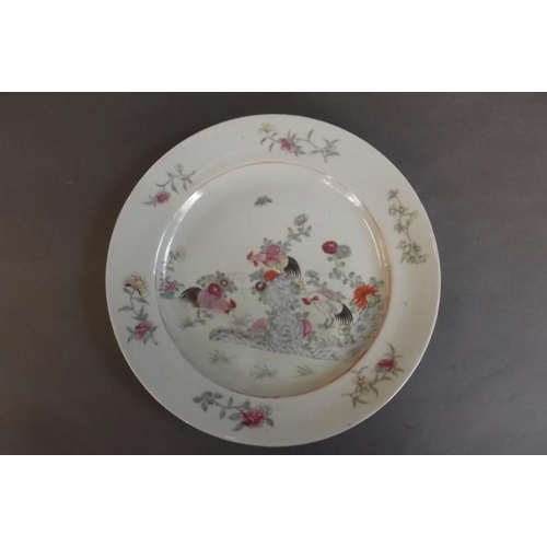 82 - A C19th Chinese porcelain plate decorated in bright enamels with cockerels in a flower garden, 10