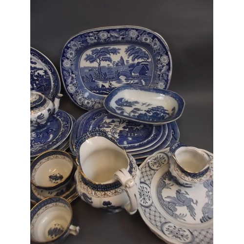 44 - A large quantity of blue and white tea and dinner wares including serving platters, tea and coffee p... 