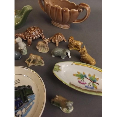 50D - Two Wade porcelain ashtrays, two planters, a collection of Whimsy including Disney, and other porcel... 