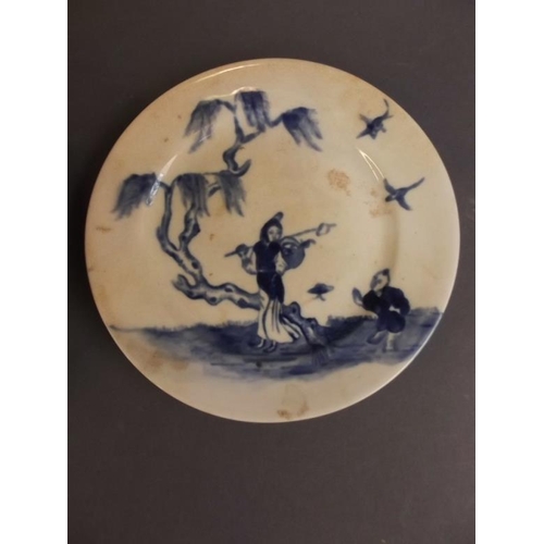 50F - An antique Chinese blue and white stoneware plate decorated with a cockerel and tree, together with ... 