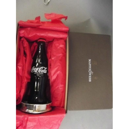 50K - Coca-Cola 100, a celebration waisted glass bottle with contents and silver plated coaster by Mappin ... 