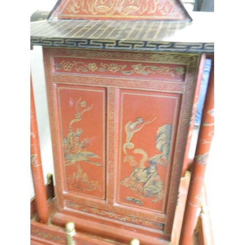 817 - A Chinese red lacquer shrine with gilt chinoiserie decoration, 26