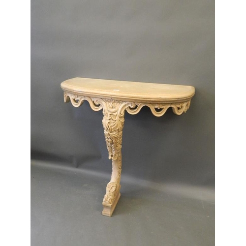 822 - A C19th lined oak D shaped console table with pierced frieze and acorn and oak leaf carved decoratio... 