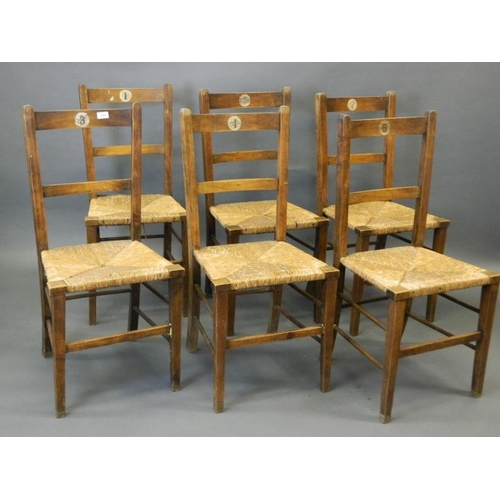 829 - A set of six early C20th beech side chairs with rush seats