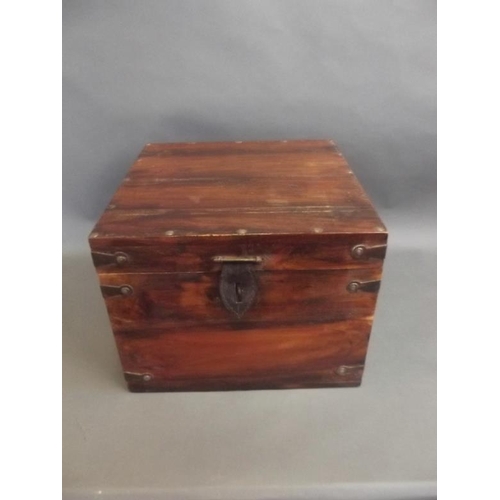 830 - A small hardwood chest with iron banding and fittings, 13