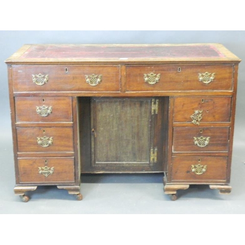 837 - A Victorian eight drawer mahogany kneehole desk with leather inset top, 46