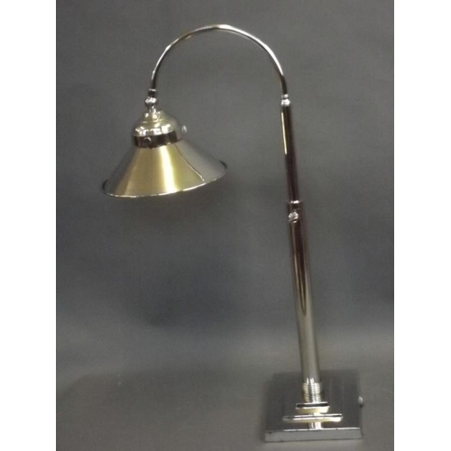 860 - A nickelplated adjustable table lamp, 21