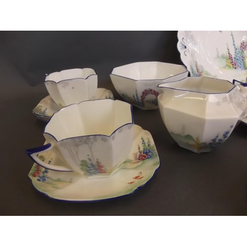 1 - A Shelley Art Deco 'Queen Anne' pattern part tea service no. 723406, decorated in the 'Summer Garden... 