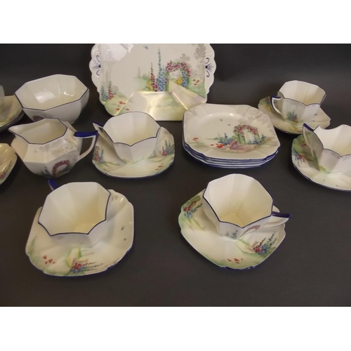 1 - A Shelley Art Deco 'Queen Anne' pattern part tea service no. 723406, decorated in the 'Summer Garden... 