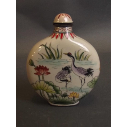 10 - A Cantonese enamel snuff bottle decorated with waterfowl, 4 character mark to base, 3