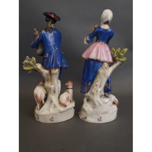 27 - A pair of C19th Paris porcelain figures of musicians with sheep, gold anchor marks, 6½