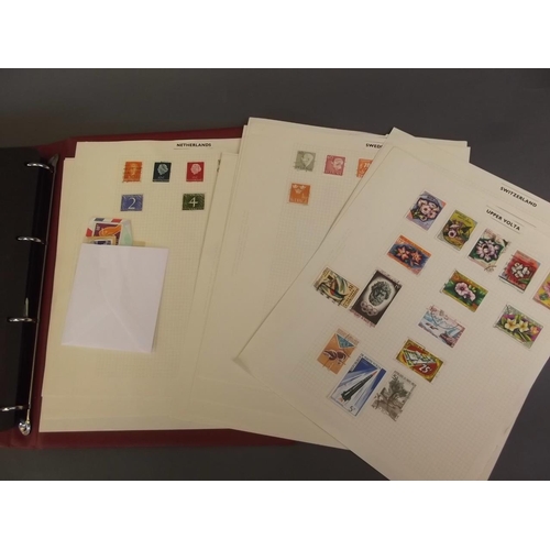 22 - An album of 'All World' postage stamps, mostly C20th, and several loose sheets of mounted stamps