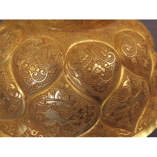 29 - A Chinese gilt metal bowl of lotus flower form with engraved animal and foliate decoration, 5